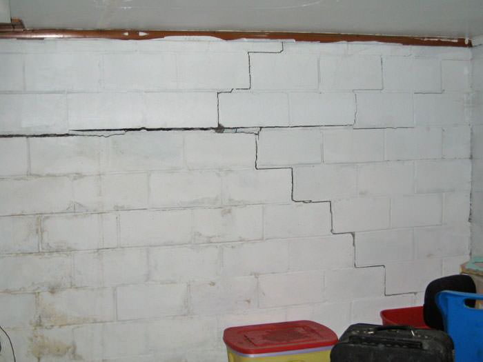 Bowing Foundation Wall Repairs in MA and NH Buckling Foundation Wall Repair in Boston