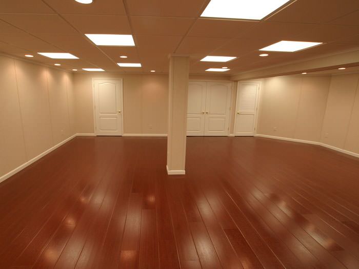 Wood Laminate Basement Floor Finishing In Manchester Boston Rosewood Faux Wood Basement Flooring For Finished Basements In Boston Waterproof